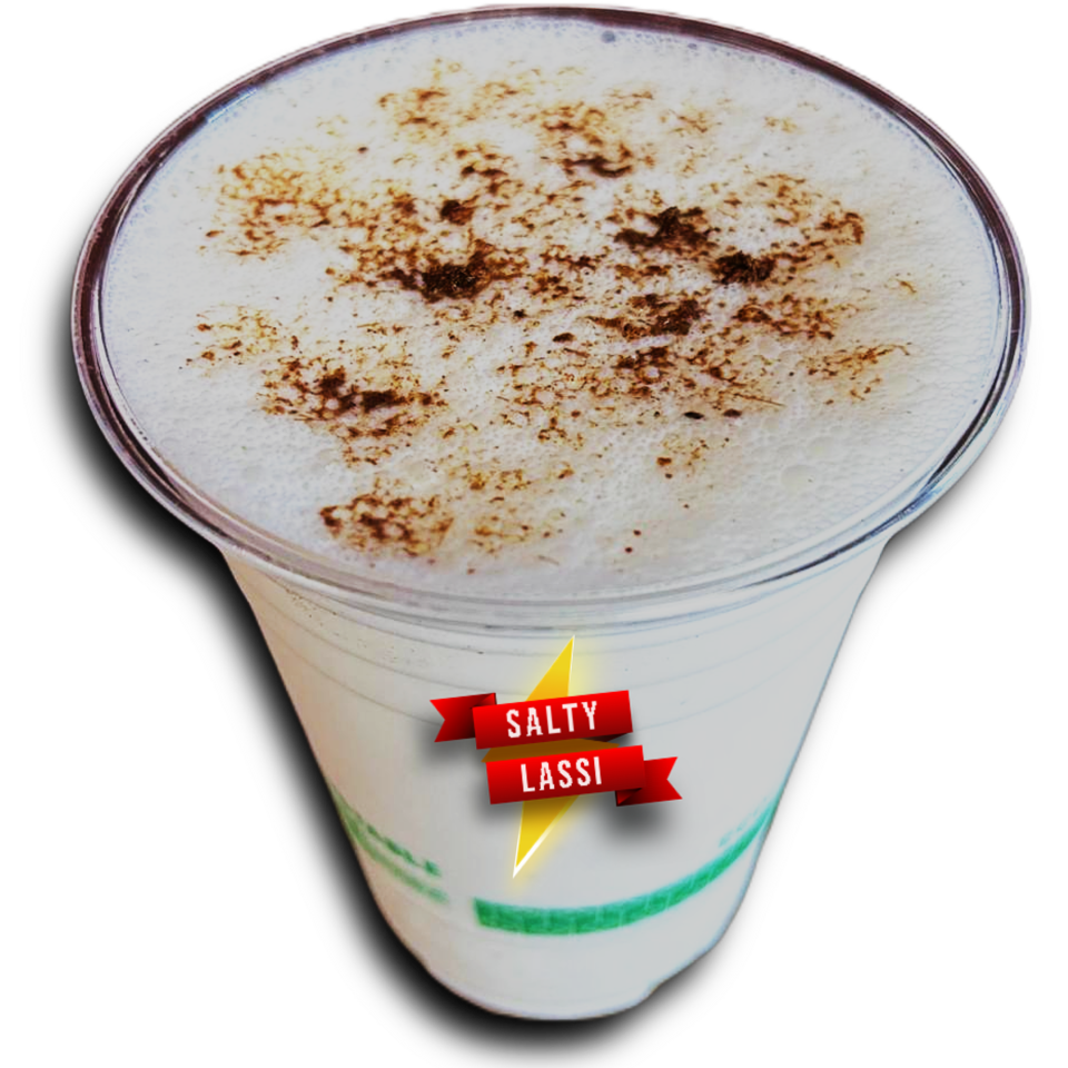 Tall glass of salted lassi topped with spices, featuring a colorful Salty Lassi label.